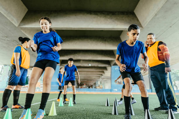 istock Soccer team training on the soccer field 1695787422