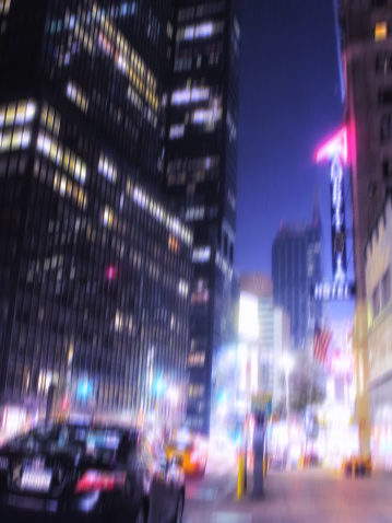Evening life at Manhattan, New York, in motion blurr and strange colors. Lots of copyspace.