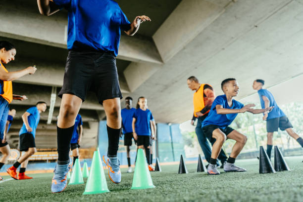 istock Low section of a soccer player training on the soccer field 1695791248