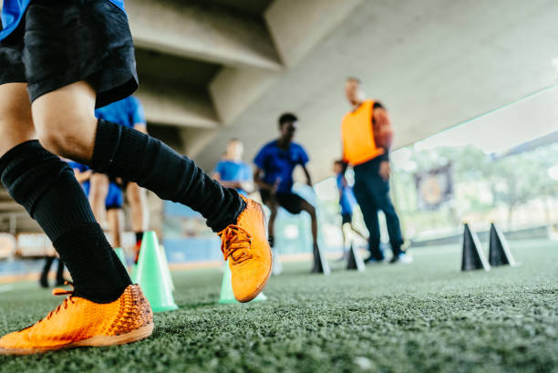 Low section of a soccer player training on the soccer field