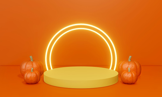 Halloween concept. Halloween pumpkins and empty product presentation pedestal podium stage with neon lighting