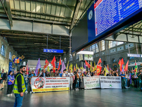 Zurich, Switzerland - September 19, 2023. Demonstration of Kurds and sympathizers at Zurich main railway station (Translation on banners: Stop Turkish aggression and invasion of Kurdish cities)