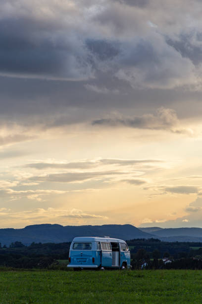 campervan german volkswagen at sundown landscape evening stock photo