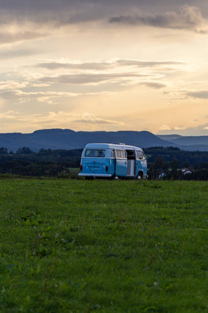 campervan german volkswagen at sundown landscape evening stock photo