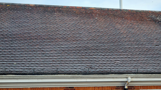 Tile roof covered in a light frost