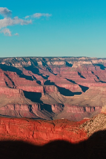 A shadow creeps up the Red Wall, Grand Canyon, Arizona.