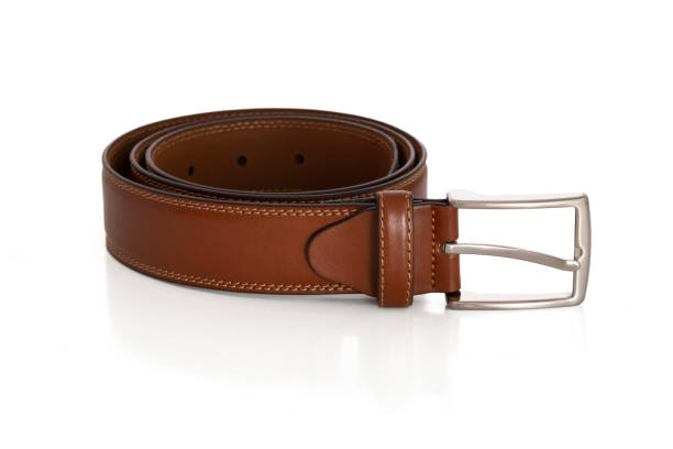 istock Brown leather belt isolated on white background 1695929240