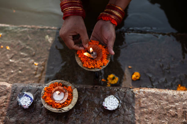 istock Candle offering at the Ganges River in Varanasi, India 1695975042