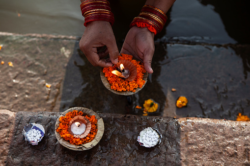 Candle offering at the Ganges River in Varanasi, India
