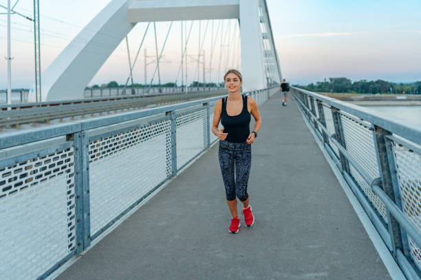 istock Sunrise run over the bridge 1696045958