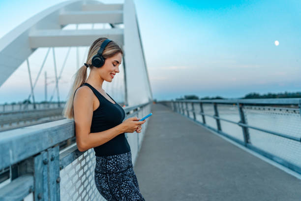 istock Engrossed in music and the web 1696046975
