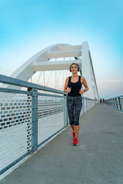 istock Chasing fitness goals on the bridge 1696047037