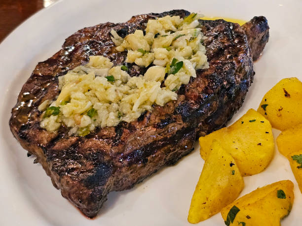 istock Sirloin with garlic and oil 1696070963