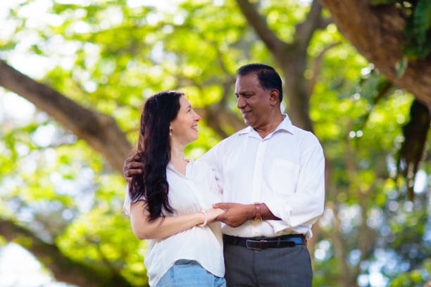 istock Interracial couple in summer park. 1696091045