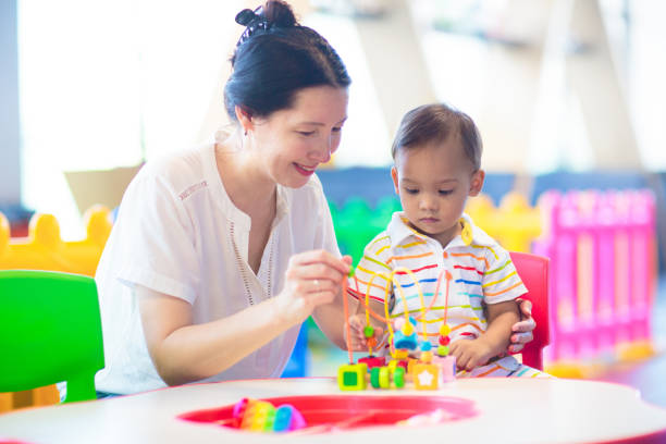 istock Cute baby boy in kindergarten or daycare. 1696095821