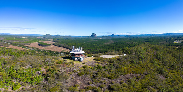 A view across the Glass House Mountains National Park from Wild Horse Mountain lookout on a clear sunny day near Brisbane, Queensland, Australia