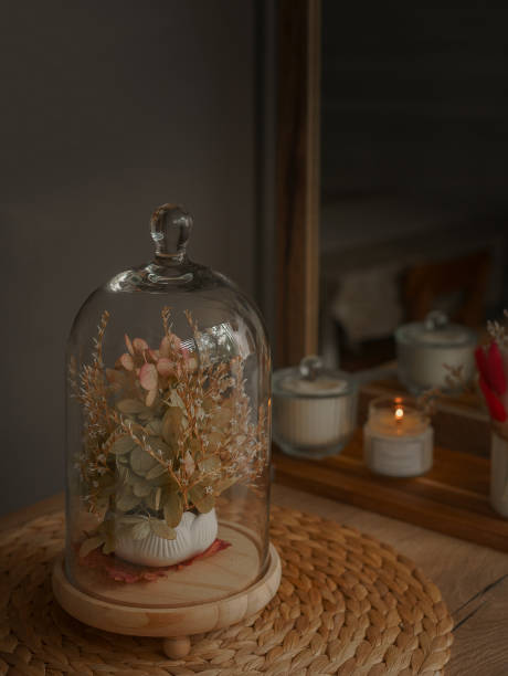 istock Cozy kitchen with a burning candle and a hydrangea flower inside a glass vase 1696179759