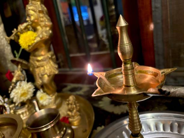 istock Kerala Vilakku lit in pooja room 1696209560