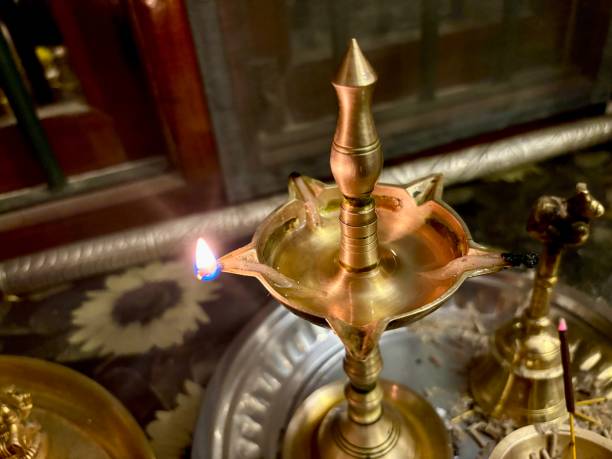 istock Kerala Vilakku lit in pooja room 1696210652