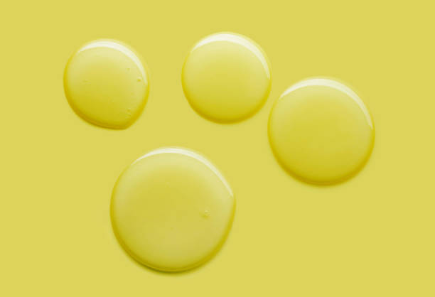 istock Yellow cosmetic mask or cleansing foam swatch smudge texture brush stroke 1696227092