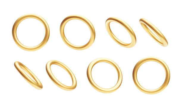 istock 3d falling golden rings, shiny jewelry accessories set. 1696243060