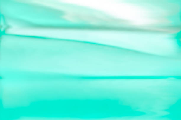 istock Bright, gentle wave pattern image in white and turquoise green watercolor style. 1696310676