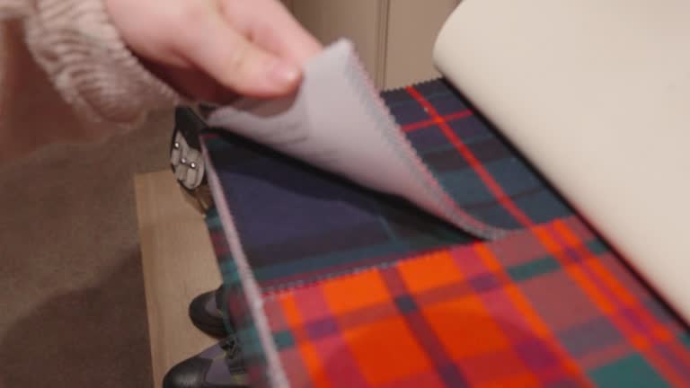 Looking through samples of different tartan patterns and styles