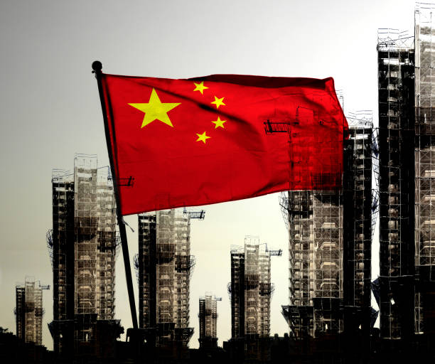 double exposure creative hologram of unfinished supertall building and chinese flag. describe china's real estate collapse, bubble, financial turmoil, and china's lehman storm - stock market china shenzhen asia imagens e fotografias de stock