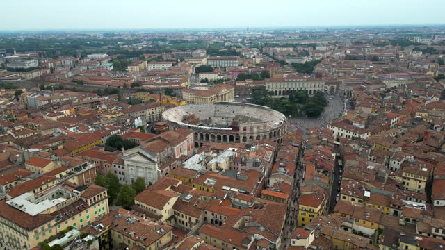 Aerial view of the historical city of Verona in Italy, The city of Romeo and Juliet, Aerial view of the Adigio river, Aerial view of the Verona arena, View of Piazza Bra in Verona,  the city of love in William Shakespeare's Romeo and Juliet