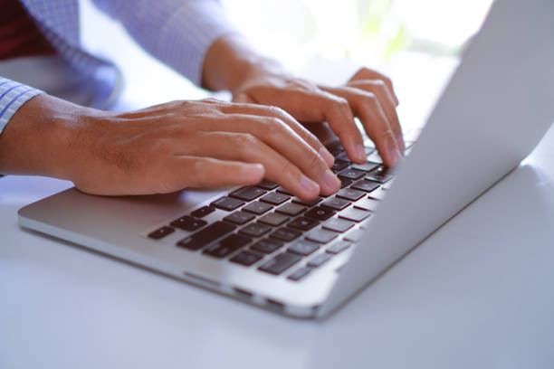 istock Man Typing on Laptop Keyboard, Creative Blog Writing Concept 1696354438