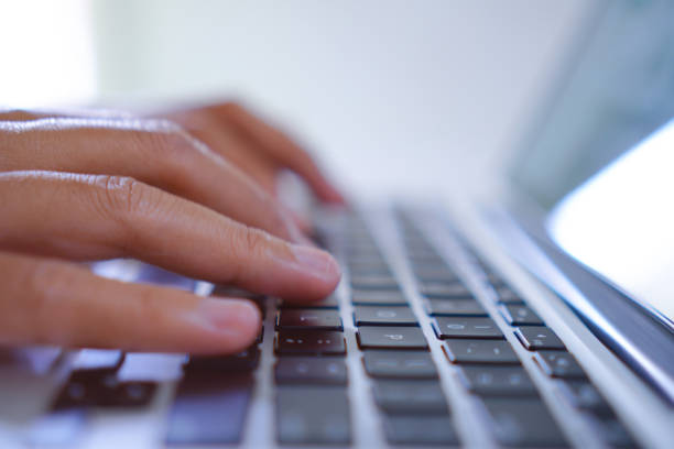 istock Man Typing on Laptop Keyboard, Creative Blog Writing Concept 1696354441