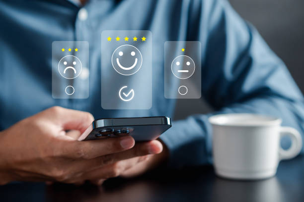 istock Experience of Customer and User give rating on online service on application smartphone, Satisfaction feedback and review give best quality good product survey ranking in top online business. 1696389974