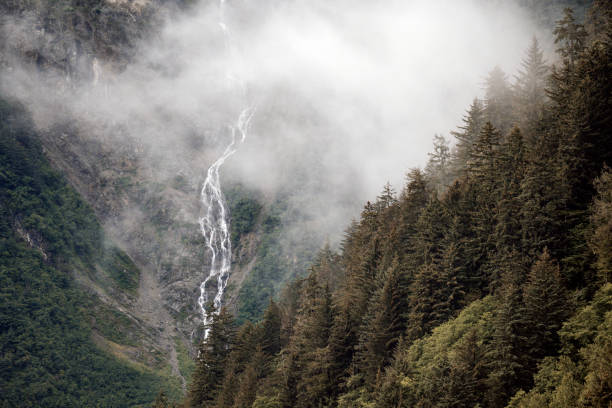 Waterfalls seen from the Juneau cruise ship terminal. Nature and environment in Alaska.