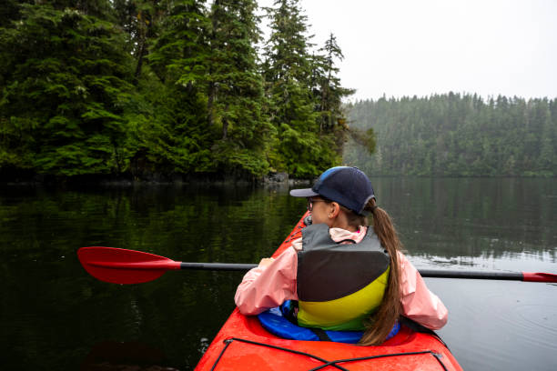 istock Girl sea kayaking 1696410143