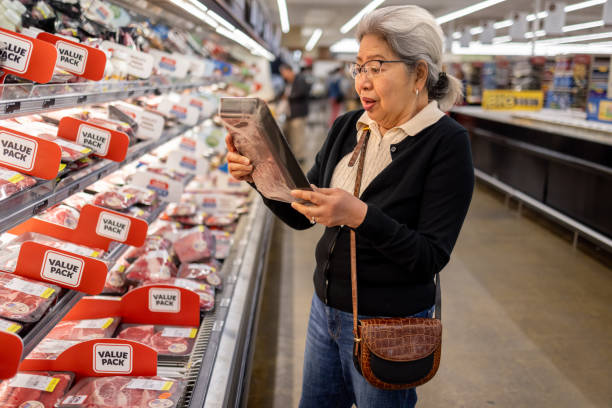 istock Senior Shopping at Grocery Store 1696426615
