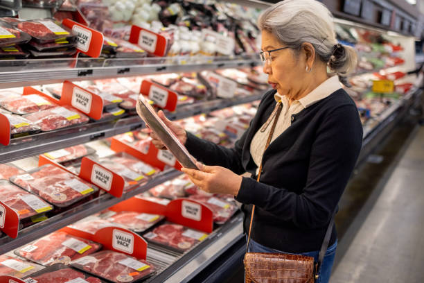 istock Senior Shopping at Grocery Store 1696426619