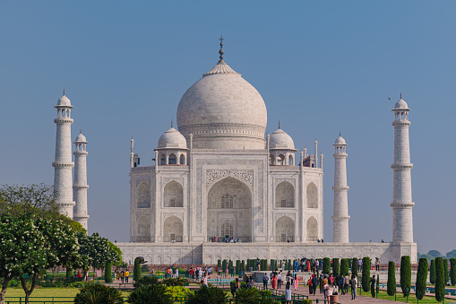 Agra, Rajasthan - India October 2000:  Side view to Taj Mahal which is one of the main tourist attractions worldwide and is a UNESCO World Heritage Site.