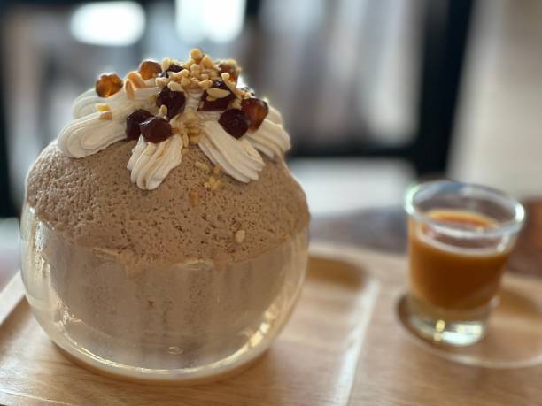 istock Taiwanese milk tea bingsu, brown konjac, whipped cream 1696517662