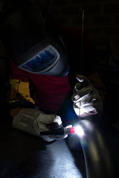istock vertical view of welder in action 1696541652