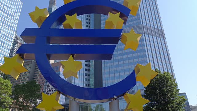 Close up view of Euro sign sculpture, stands in front of the Eurotower of the European Central Bank.