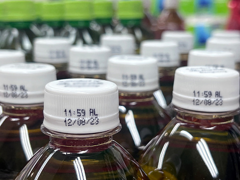 Closeup of expiry date on bottle of drinks