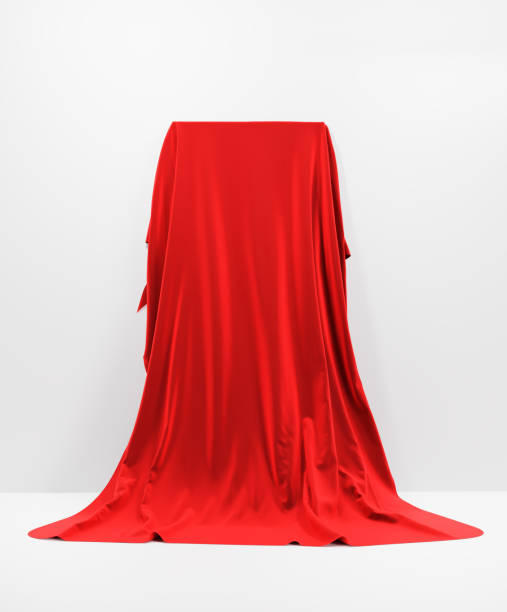 istock Flows of red fabric of various shapes on a white background. 3D illustration 1696633548