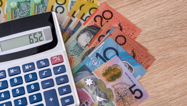istock Australian money aud with calculator on desk. 1696640400