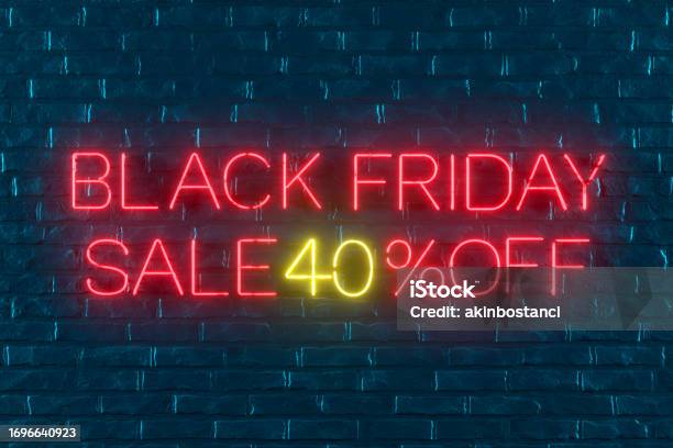Black Friday Sale 40 Off With Neon Light On Black Brick Wall Stock Photo - Download Image Now