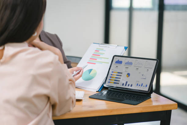 istock Two businesswoman advisor team analyzing data charts, graphs, and a dashboard on laptop screen. Data analysis concept 1696646590