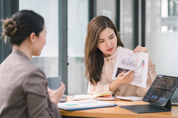 istock Two businesswoman advisor team analyzing data charts, graphs, and a dashboard on laptop screen. Data analysis concept 1696646594