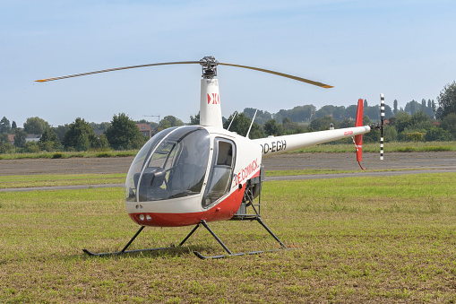 Sint Truiden. Limburg - Belgium 03-09-2023. Robinson R22 Beta. Public  airshow of vintage aircraft  at the Sint Truiden Aero Club