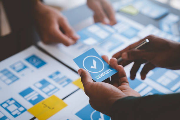 istock A group of Asian UI developers, designers, and data researchers are brainstorming their projects with laptops, smartphones, and digital tablets. Creative Digital Development Agency. 1696691443