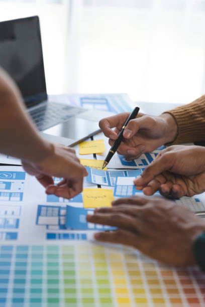 istock A group of Asian UI developers, designers, and data researchers are brainstorming their projects with laptops, smartphones, and digital tablets. Creative Digital Development Agency. 1696699360