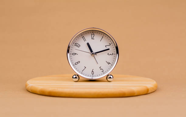 istock Alarm clock, time clock, appointment time, punctuality, working with time, time concept, modern clock 1696713941